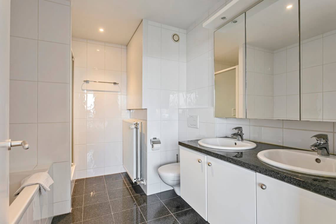 ensuite in one bedroom serviced apartment with double basin sink