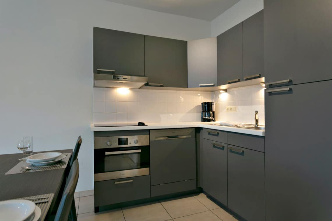 fully equipped kitchen in two bedroom serviced bbf apartment brussels