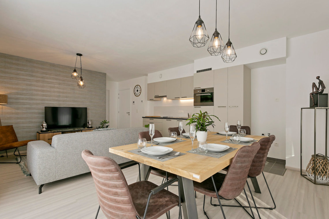 b-square two bedroom apartment with six person dining table