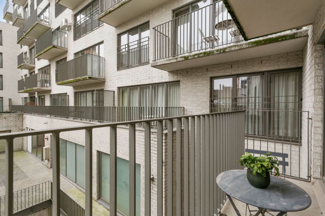 living room of serviced studio apartment with external balcony