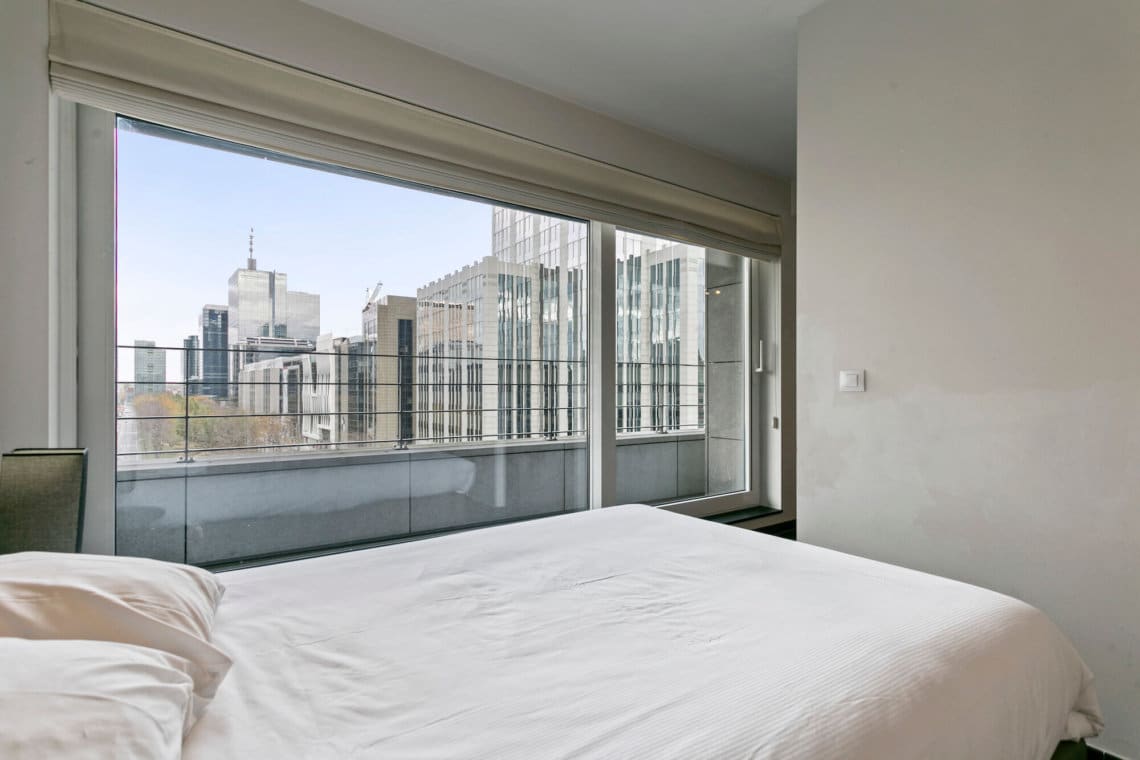 manhattan view two bedroom apartment double bed with city views