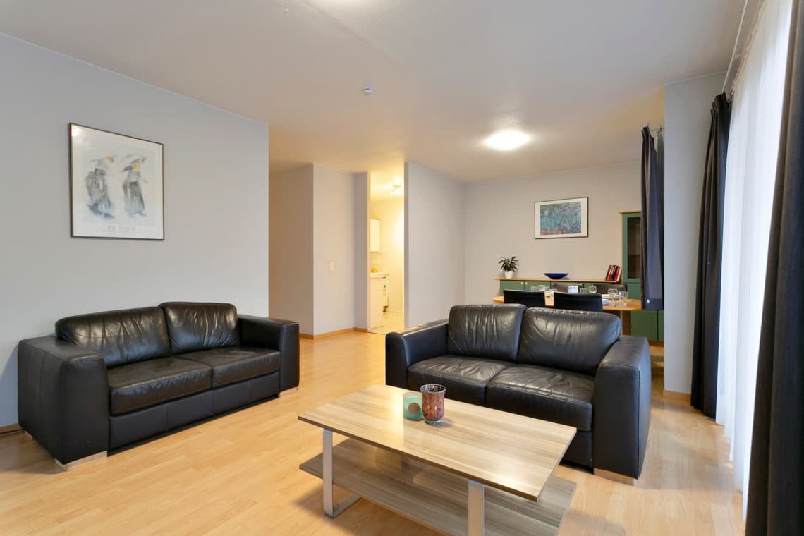 dunant gardens two bedroom apartment living room with two sofas