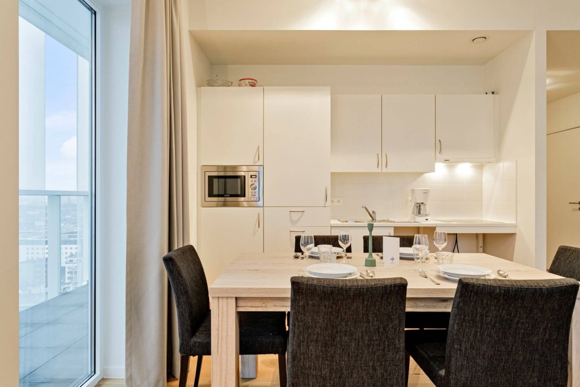 dining room and fully equipped kitchen in bbf serviced apartment antwerp