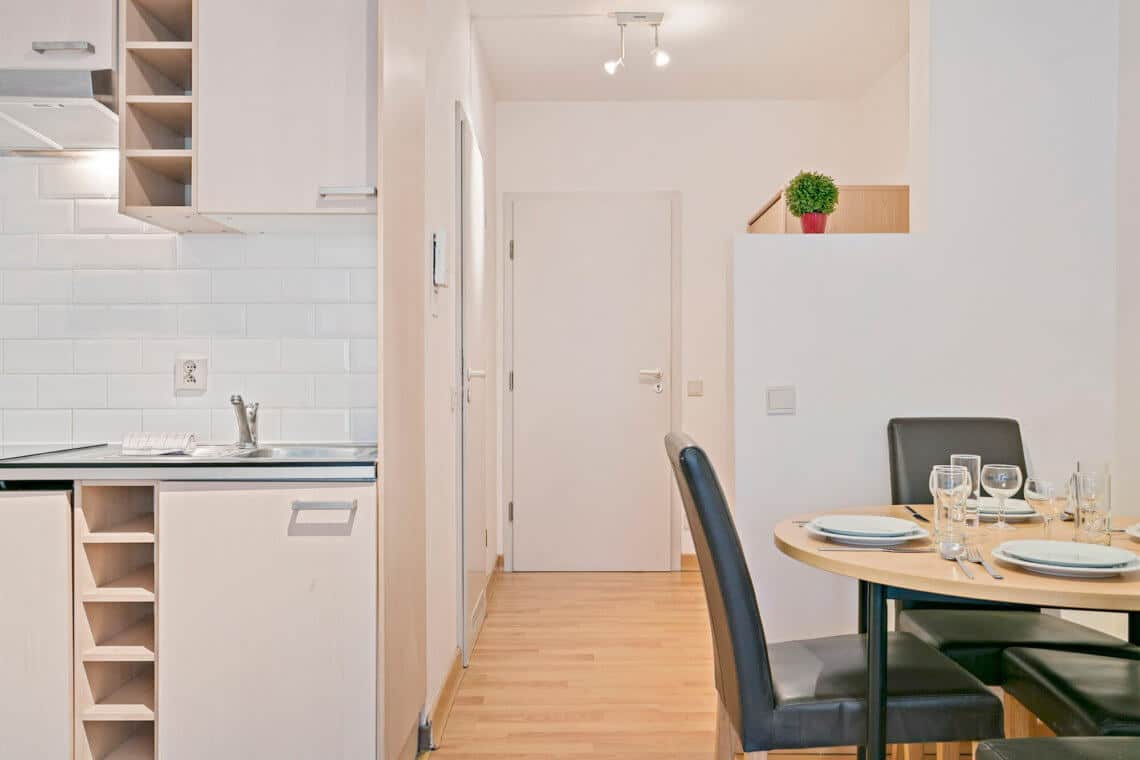 fully equipped kitchen in serviced studio apartment near nato