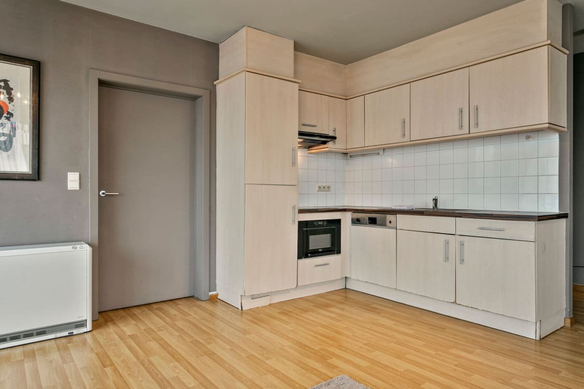 fully equipped kitchen in serviced one bedroom apartment