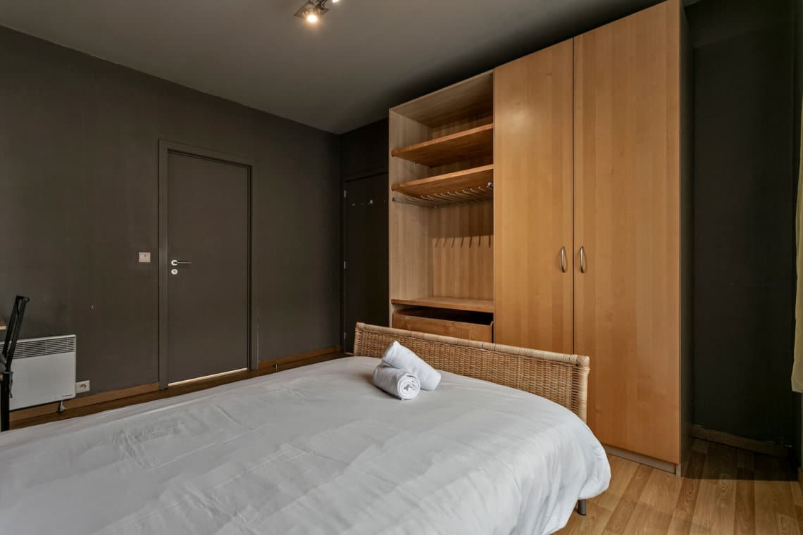 wardrobe with storage in one bedroom serviced apartment in brussels city centre