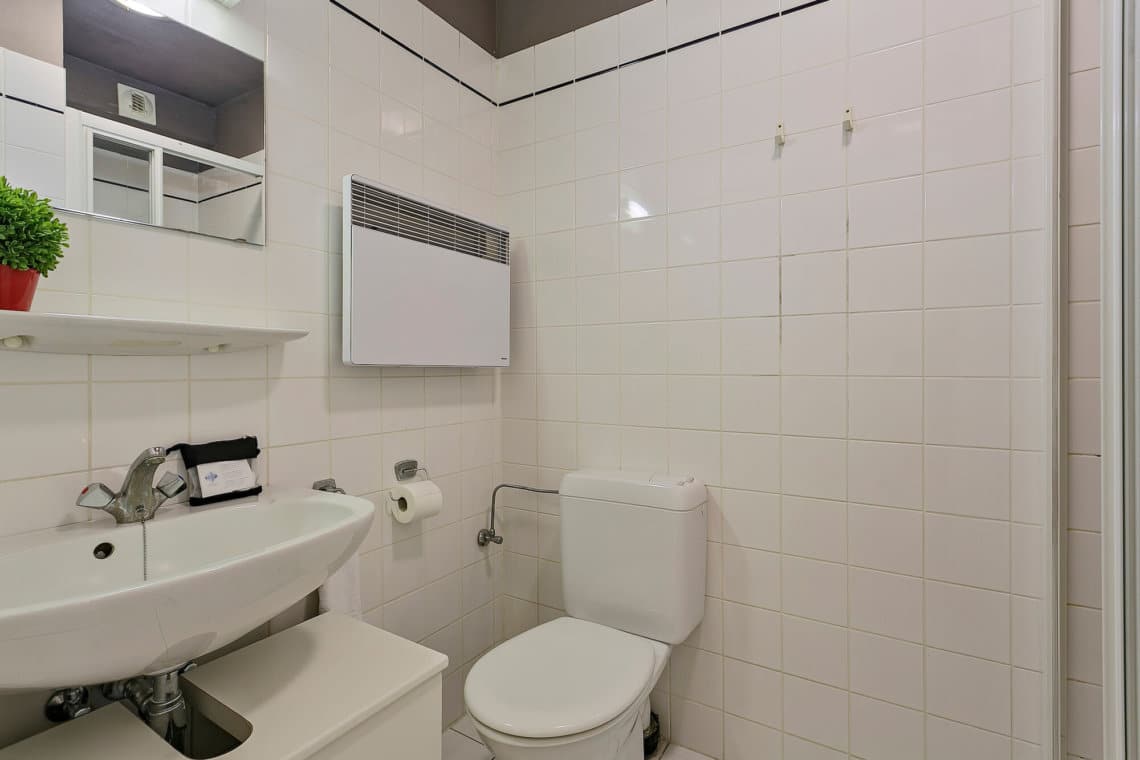 bathroom with toilet and bi-weekly cleaning