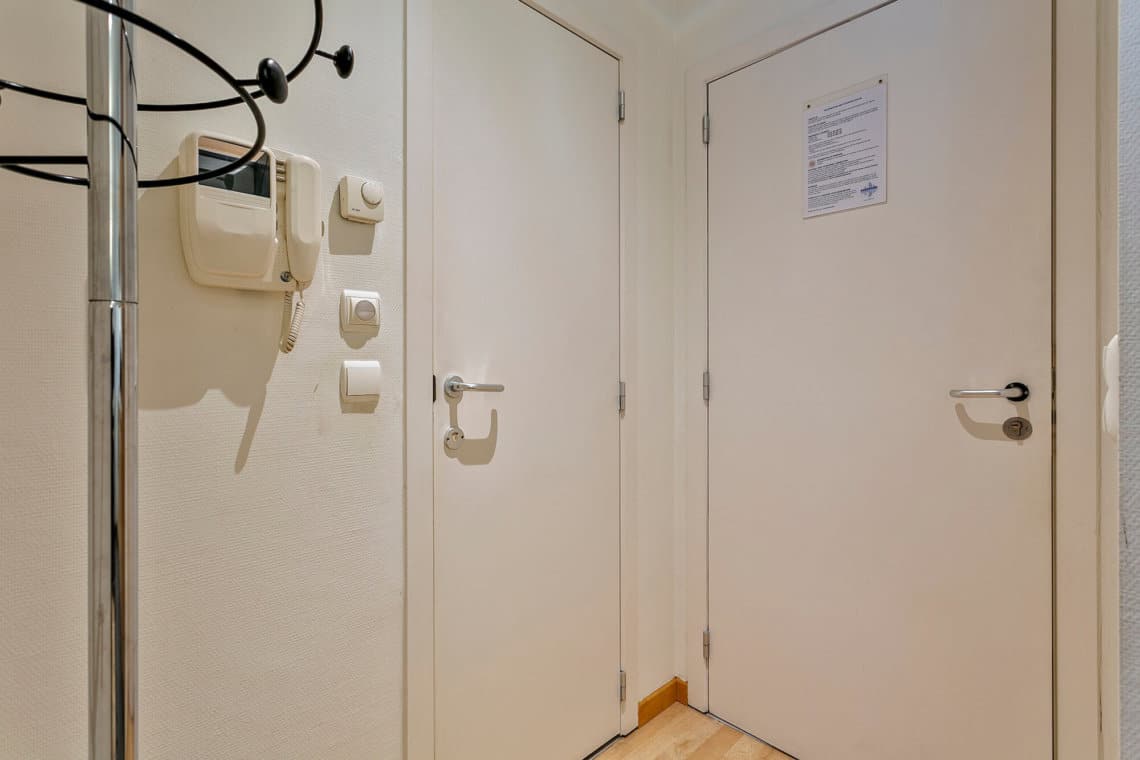 entrance hall with coat rack in europark apartment