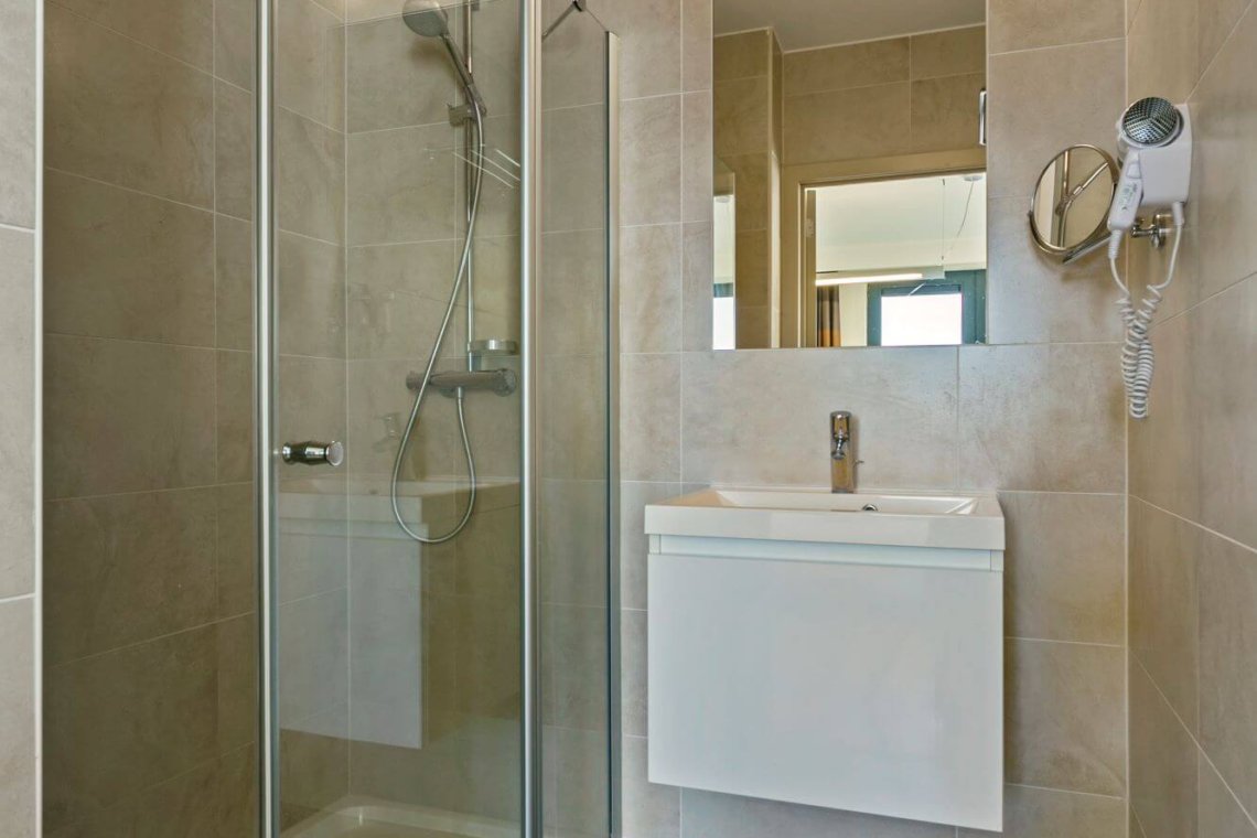 ensuite with shower in three bedroom apartment