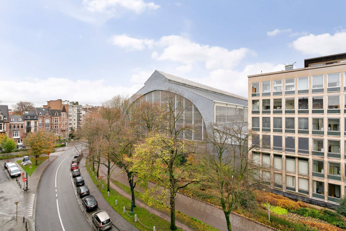 serviced studio apartment balcony looking over park cinquantenaire