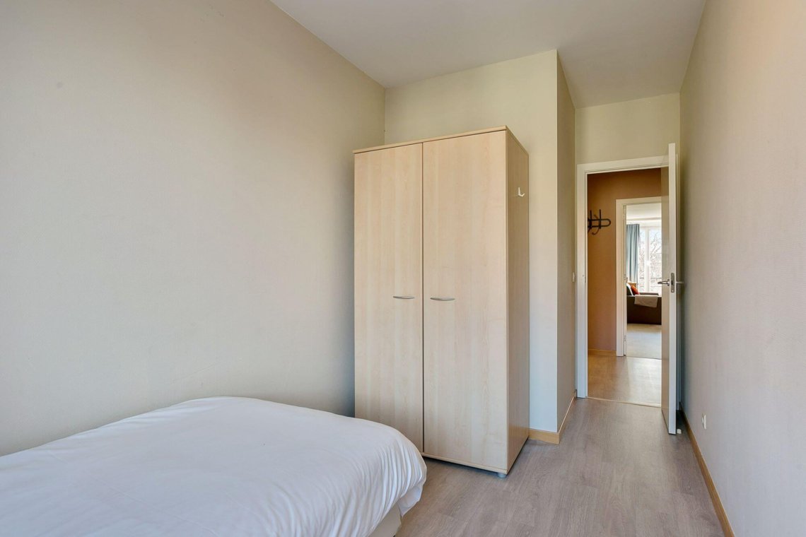 second bedroom with single bed and wardrobe