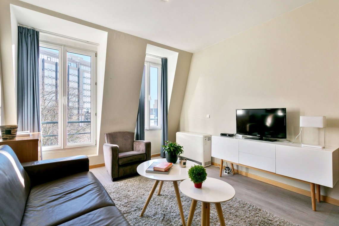 living room with cable television in bbf apartment in brussels