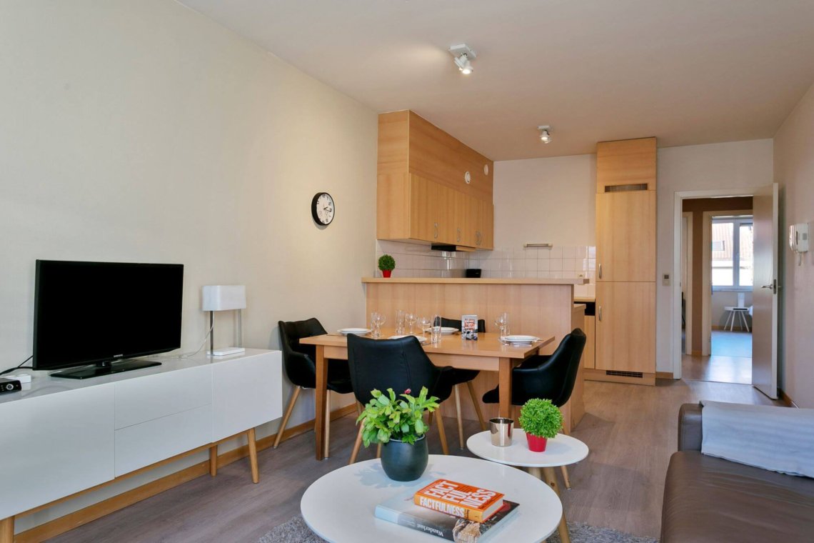 cable tv and dining table in bbf serviced apartment