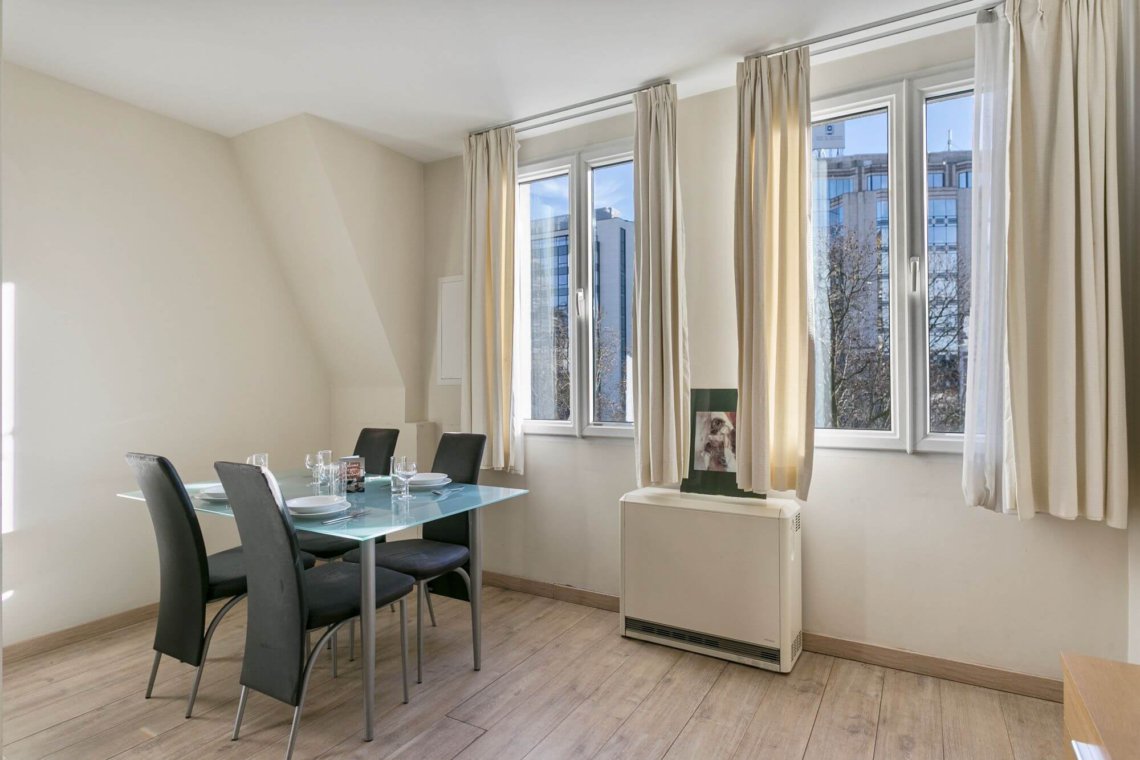 four person dining table in bbf serviced apartment in louise brussels