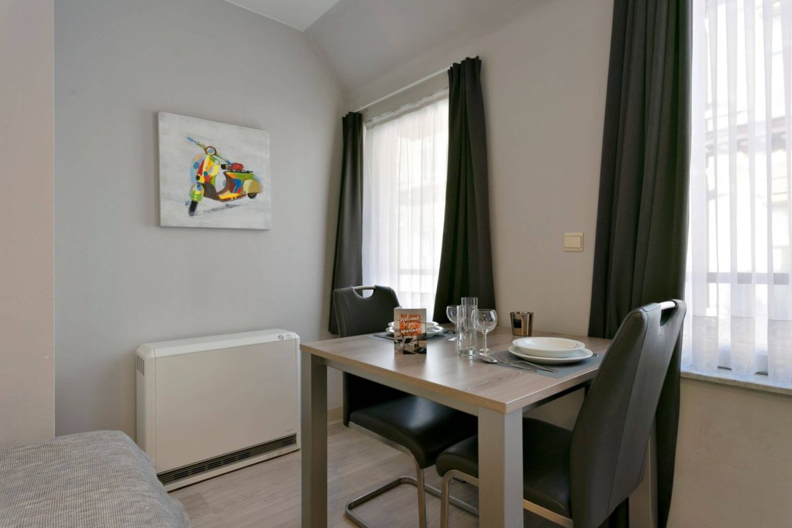 two person dining table in studio serviced apartment