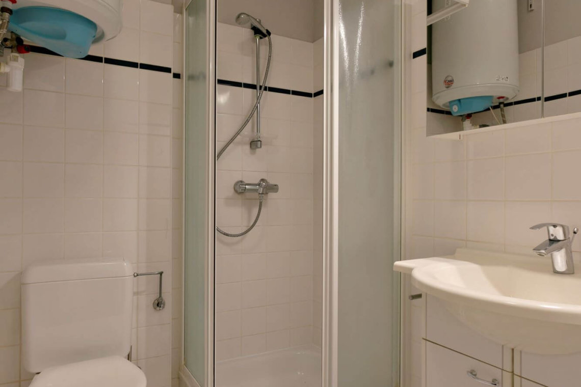 bathroom with shower in bbf studio apartment