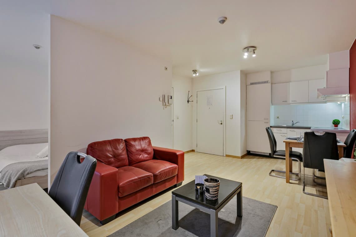 living room with sofa and office desk in bbf apartment