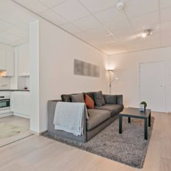 living room with sofa and coffee table in brussels city centre serviced apartment