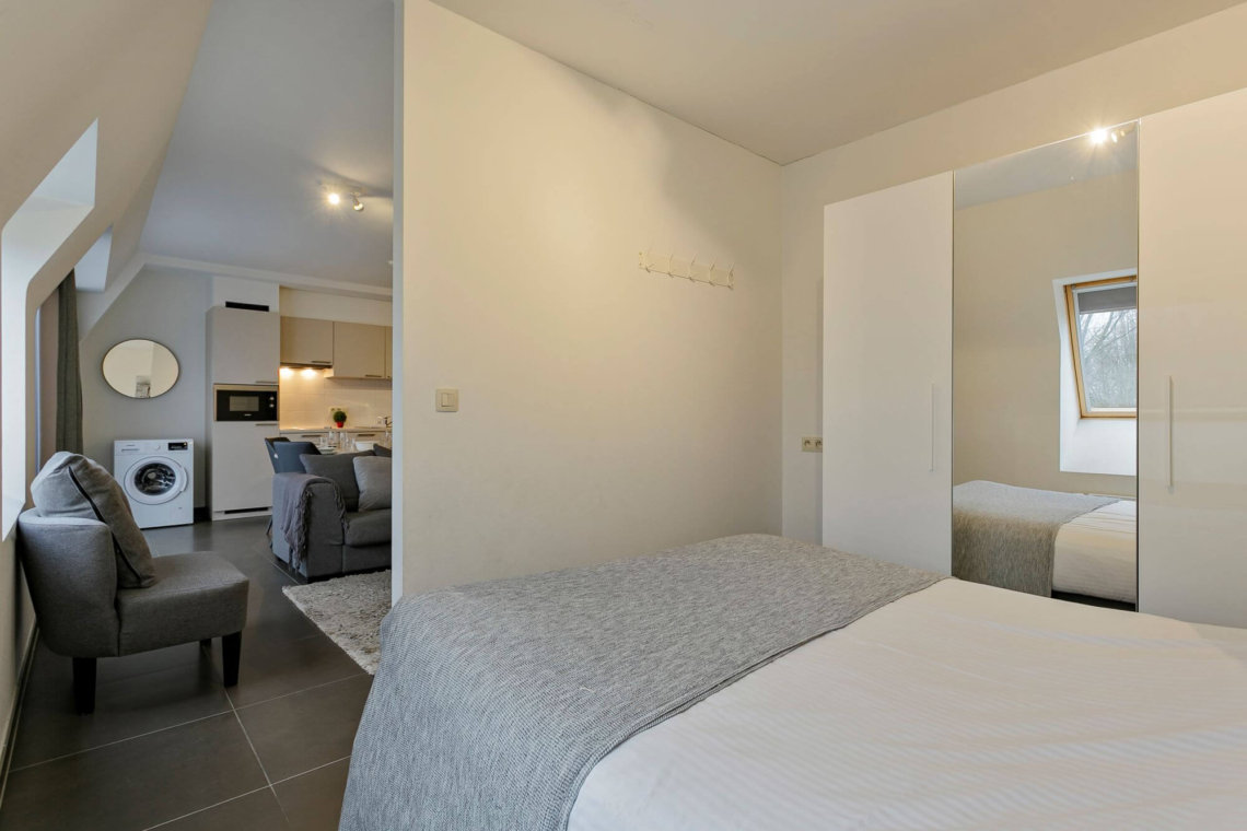 master bedroom in bbf serviced apartment west brussels