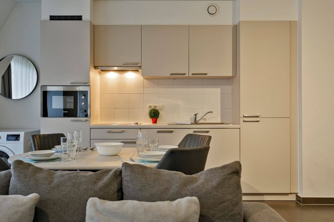 fully equipped kitchen in serviced apartment in west brussels