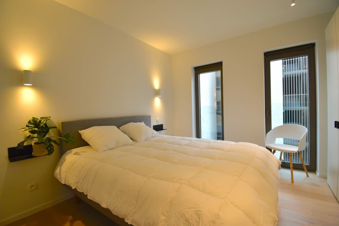 A furnished bedroom in Kaai 15 Residence in Ghent.